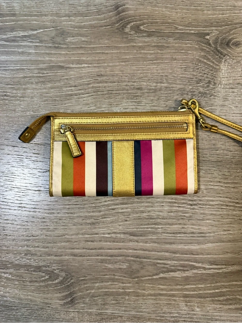 Coach Legacy multi color stripe wristlet